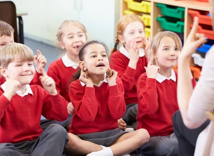Children singing in class